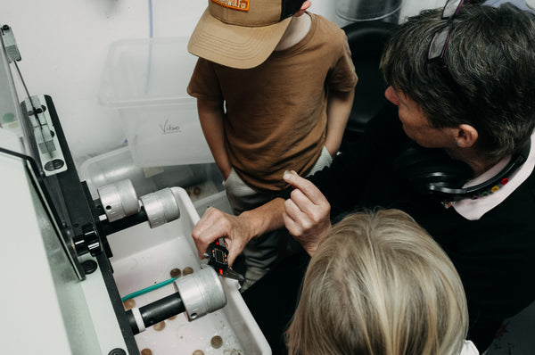 British manufacturing of custom buttons for the Cairn waxed cotton overshirt