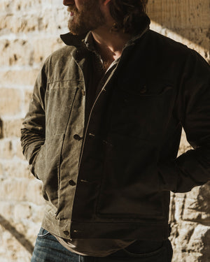 Bear&Wolf founder Jake Green modelling the stac in kelp green on a photoshoot in the cotswolds.