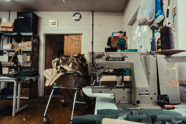 A vintage Brother industrial sewing machine in the factory used to make the Bear&Wolf Stac jacket in the UK.