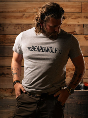 Man wearing Bear&Wolf organic cotton logo tee in Slate, front view