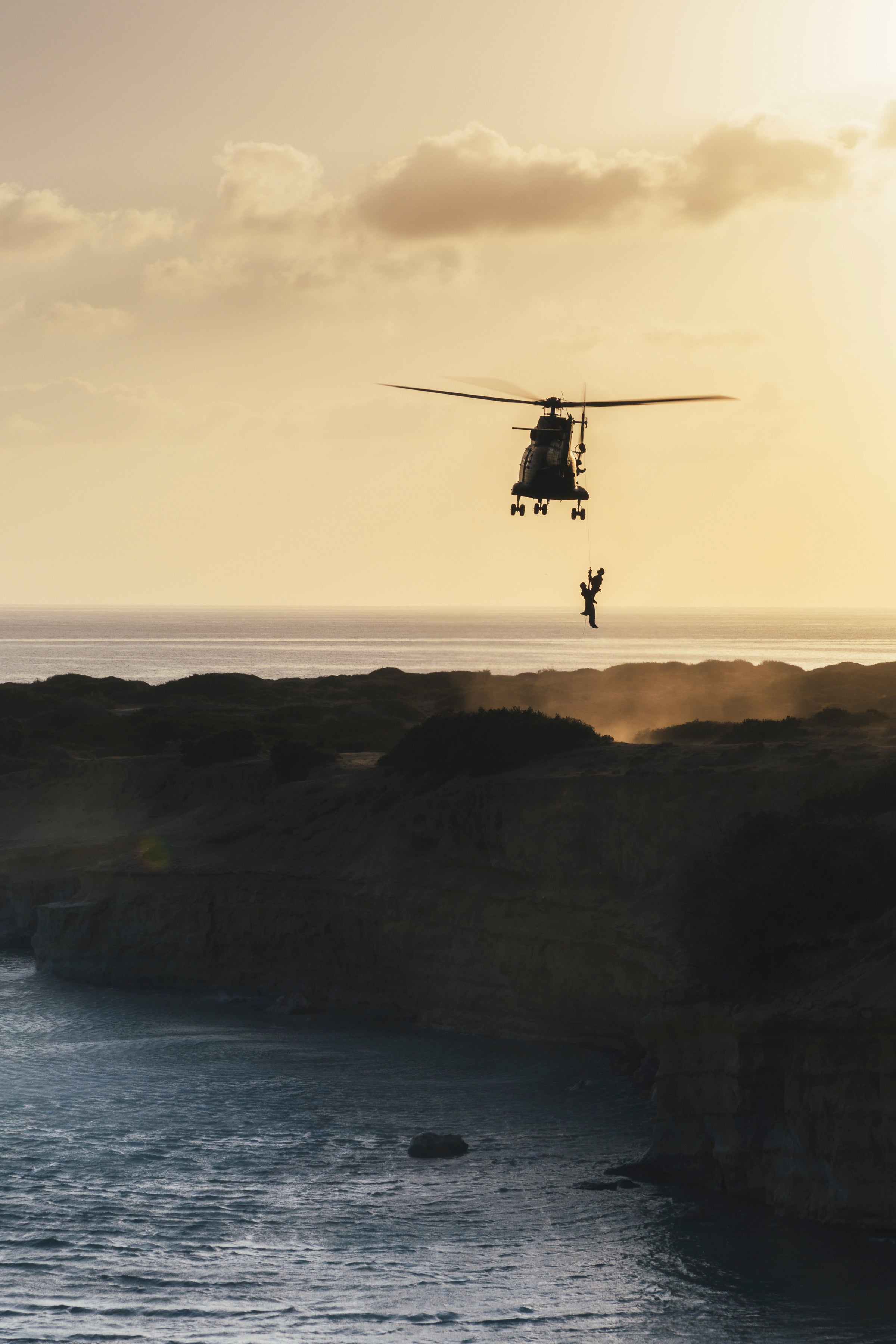 RAF Puma helicopter conducting a winching exercise over the Cyprus coastline during Jake Green's posting at RAF Akrotiri